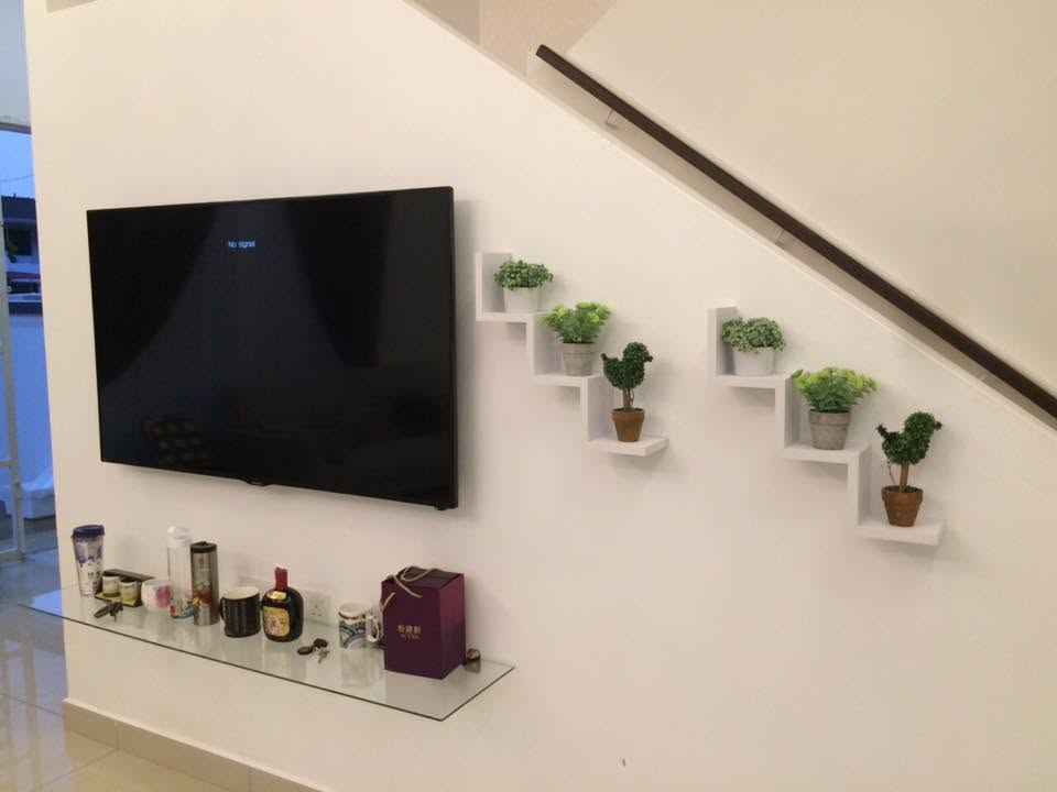 Public EMPRO Facebook portfolio image showing a finished media wall and living interior